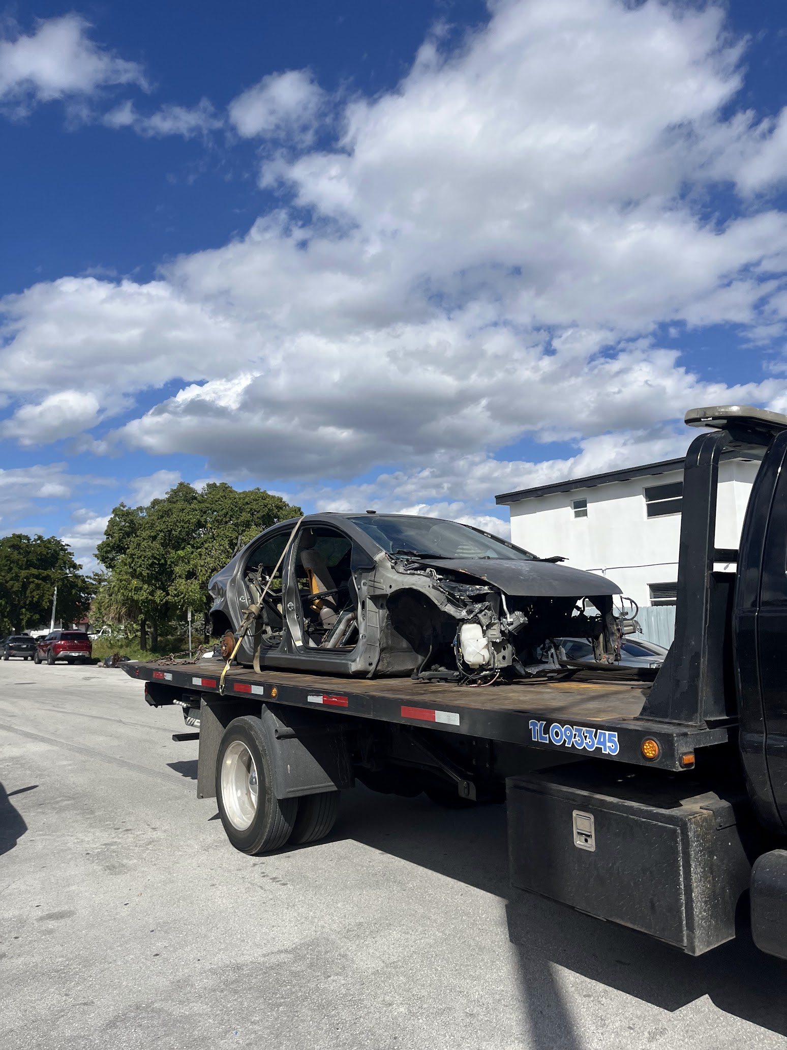 Professional vehicle shell removal service by Rapid Towing 305